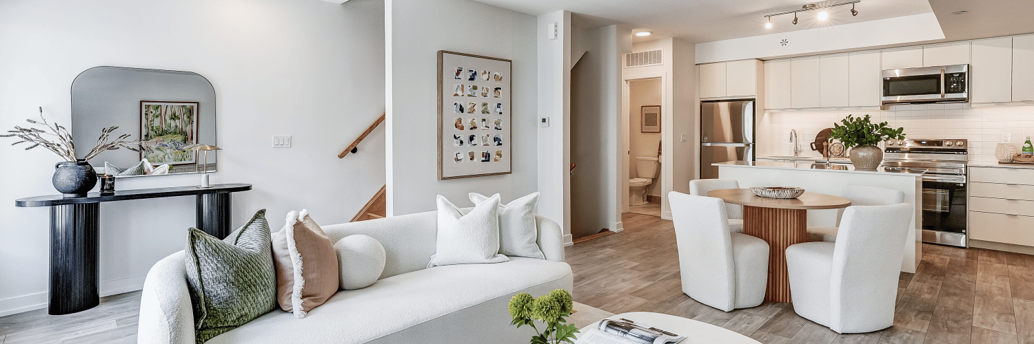 Staged open concept living room and kitchen at The Towns at York Mills & Leslie.